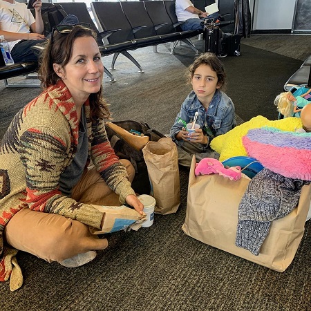 Jodi Faeth sitting with her daughter as a 7-year-old.